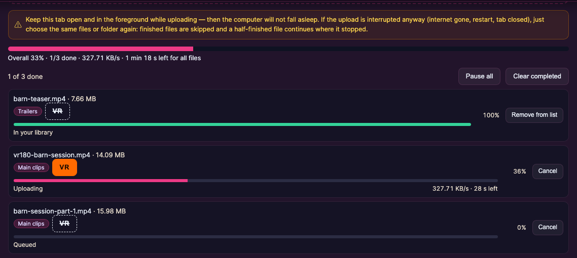 The upload queue: a finished trailer, one file uploading with speed and time left, one queued, and the Overall bar.